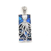 Silver octopus pendant with blue background on a white background