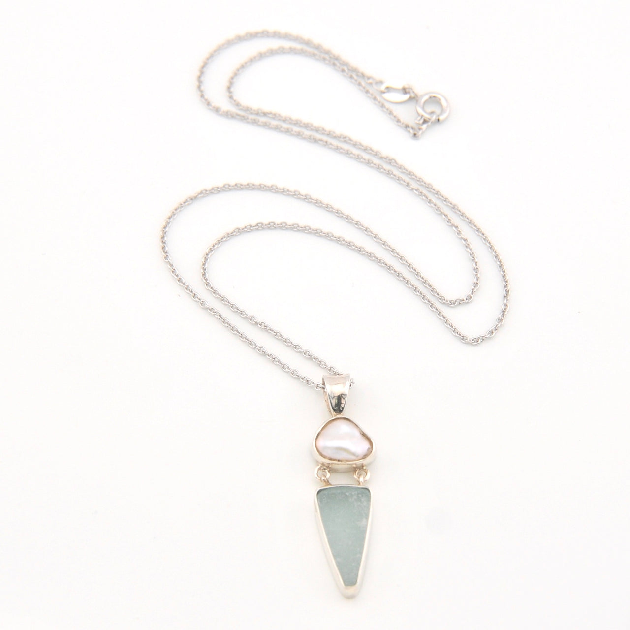 Necklace with a triangular pendant on a white background