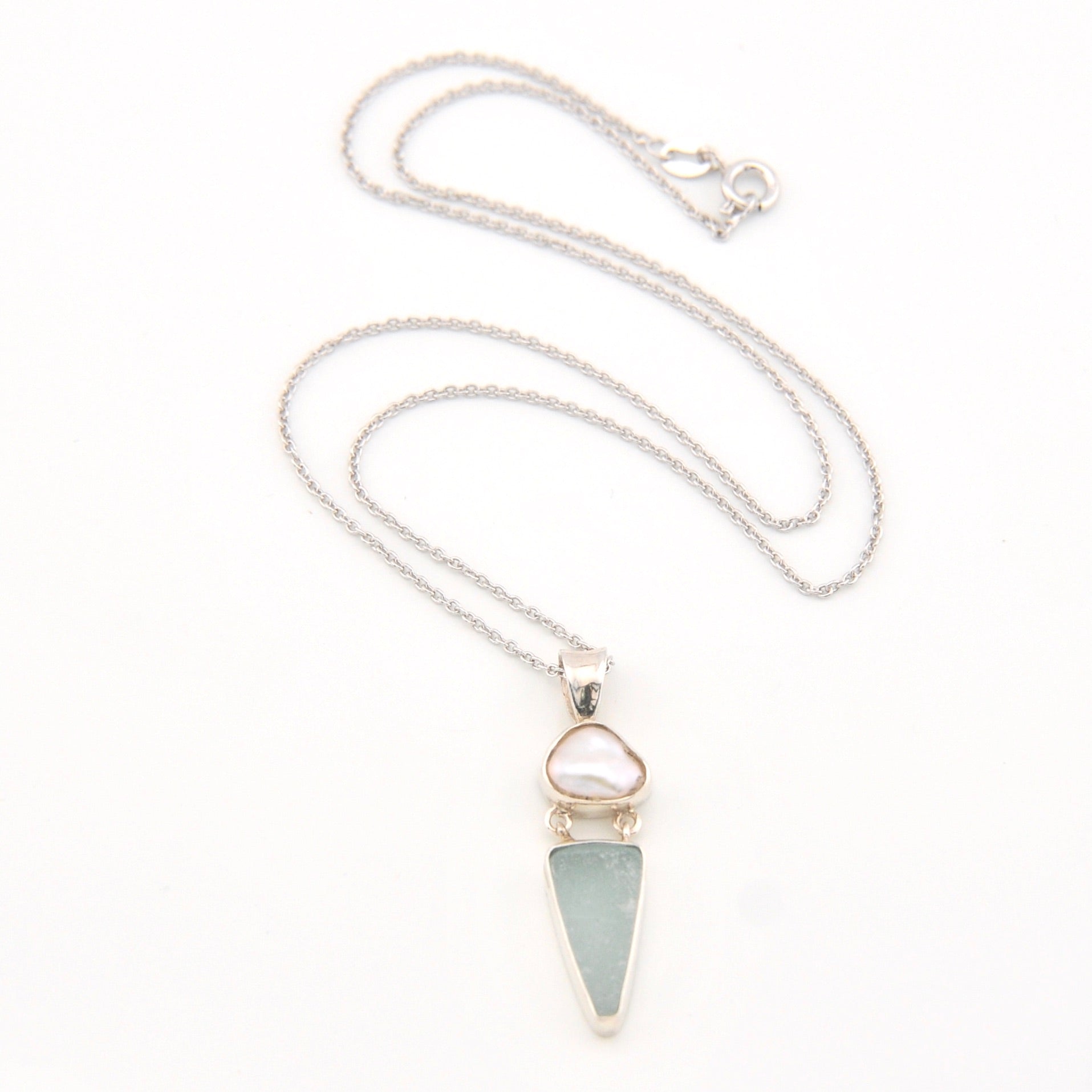Necklace with a triangular pendant on a white background