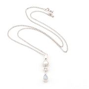 Silver necklace with a pendant on a white background