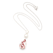 A silver teardrop pendant necklace featuring a white pearl and a marbled red and white teardrop charm, displayed on a clean white background.
