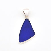 Blue pendant with silver chain on a white background