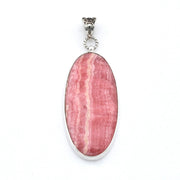 An oval pendant featuring a pink and white banded mineral stone in a polished silver bezel setting with a silver bail, shown against a plain white background.