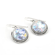Silver earrings with round Roman glass on a white background