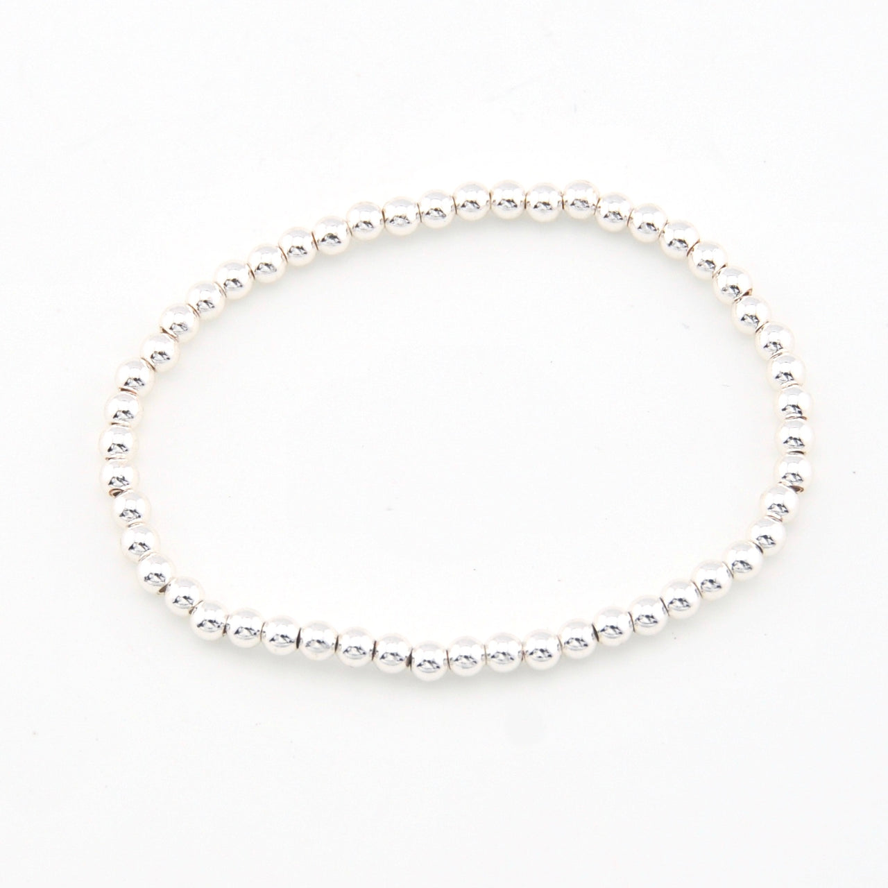 Silver bead bracelet on a white background