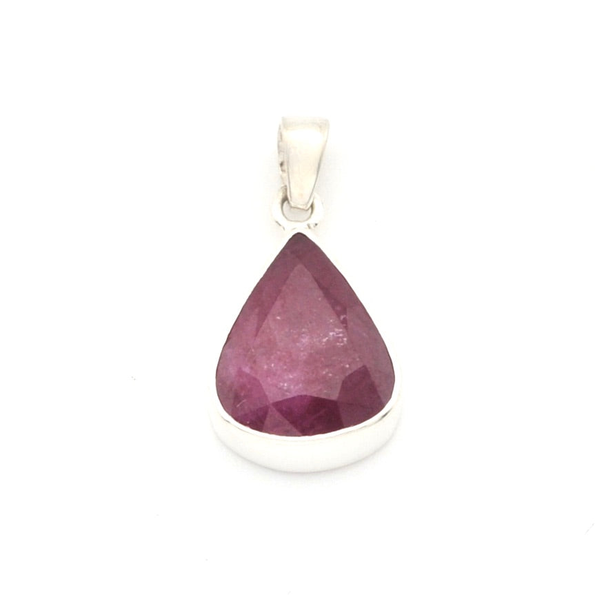 Teardrop-shaped purple gemstone pendant on a white background