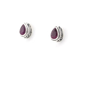 Pair of silver earrings with purple gemstones on a white background