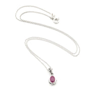 Silver Ruby 5x7mm Oval Bali Necklace on white background