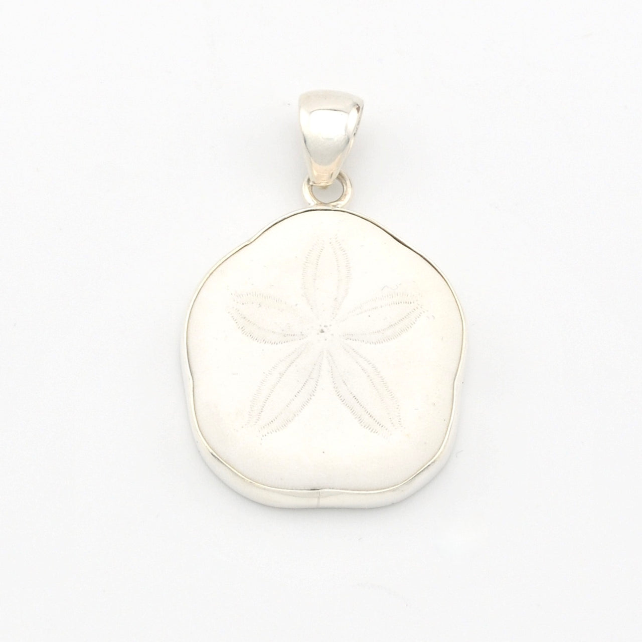 Silver pendant with a sand dollar on a white background