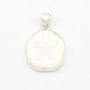 Silver pendant with a sand dollar on a white background