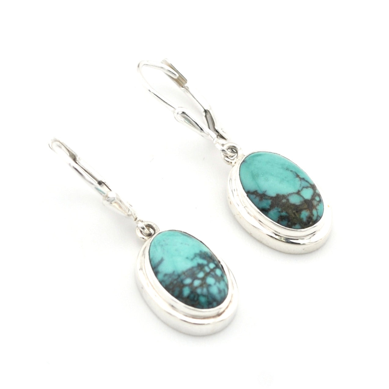 Silver Turquoise Oval Dangle Earrings on white background