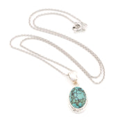 Turquoise pendant necklace on a white background