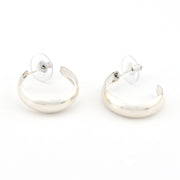 Pair of silver hoop earrings on a white background