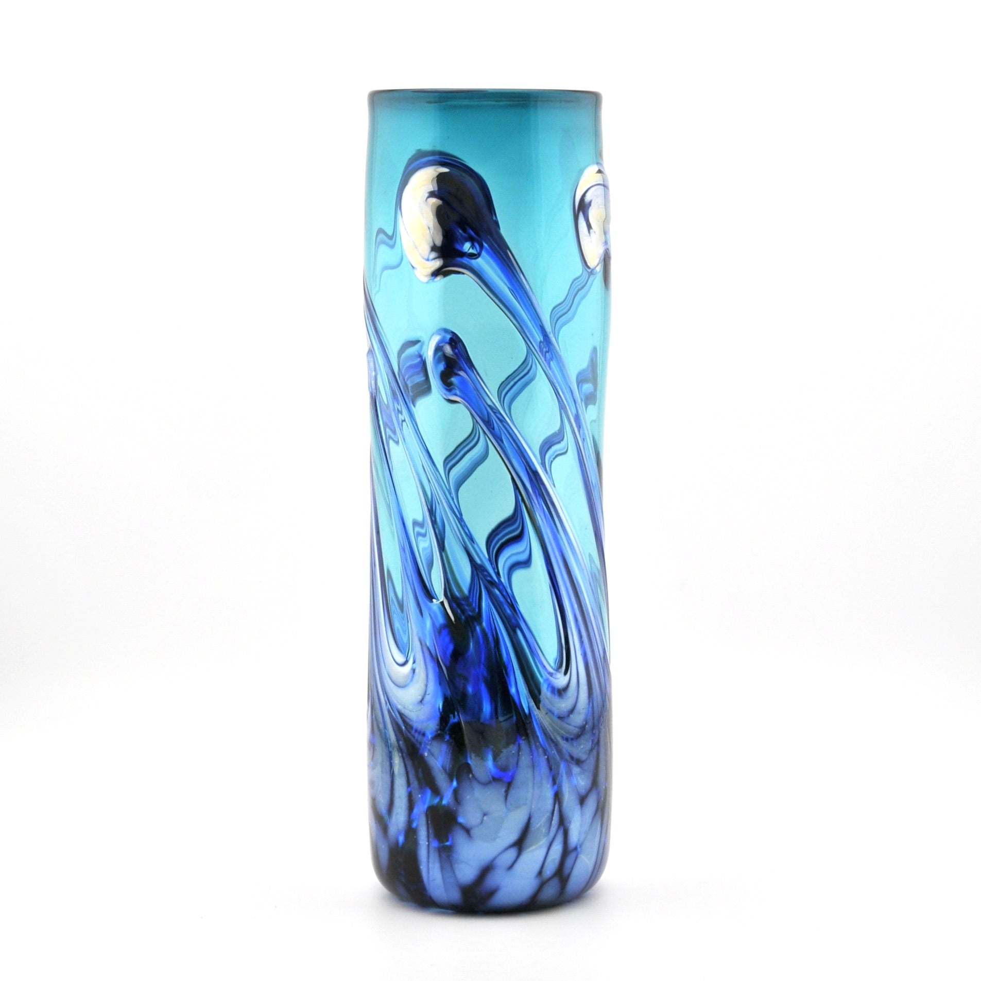Blue glass vase with swirling patterns on a white background