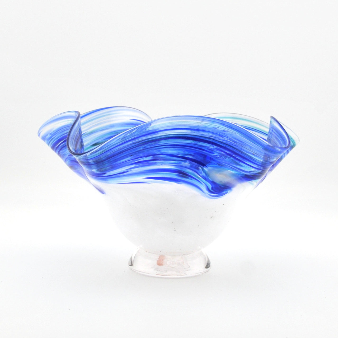 Glass bowl with blue and clear design on a white background