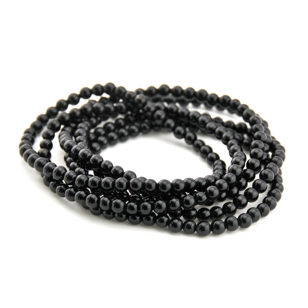 Black beaded necklace on a white background