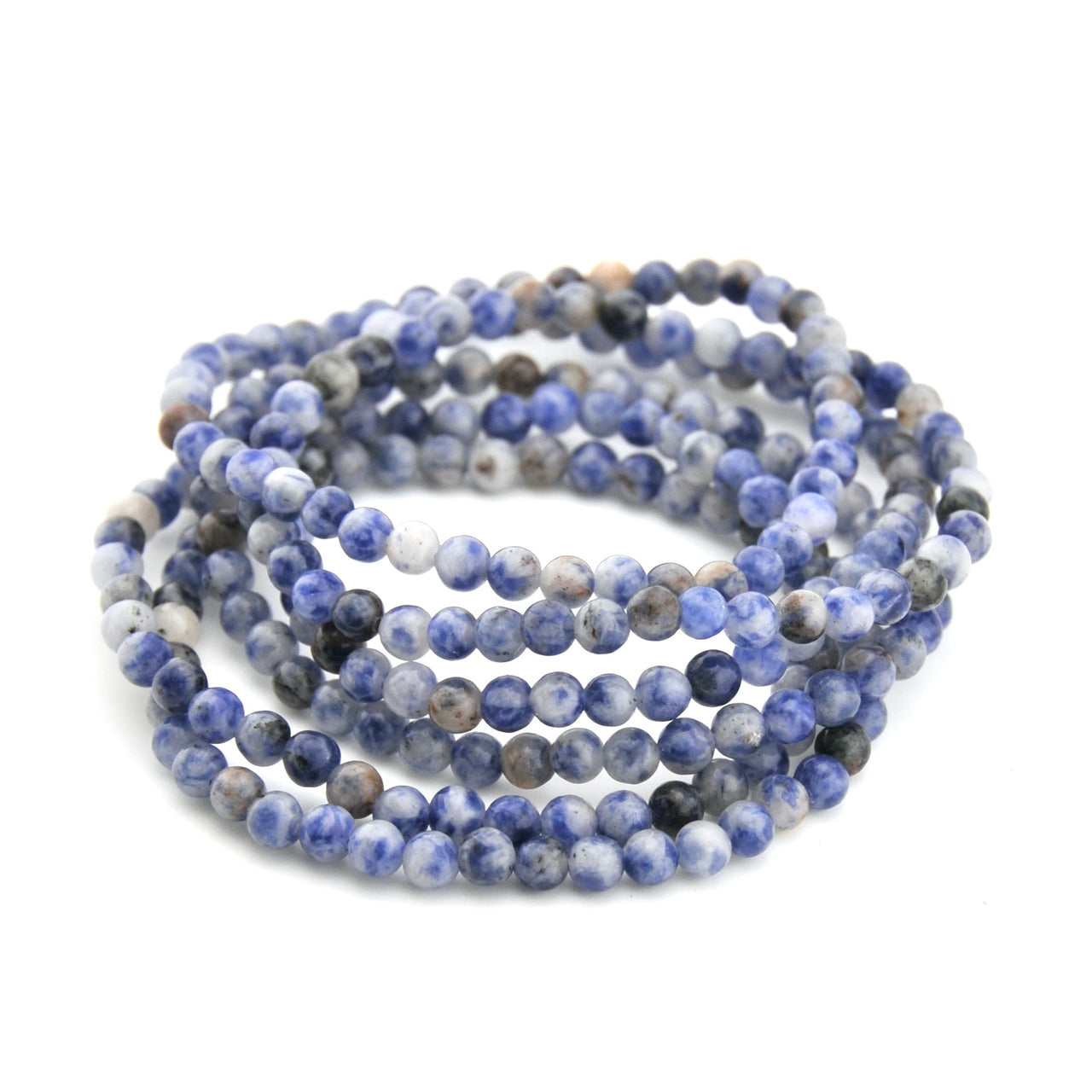 Stack of blue and gray beaded bracelets on a white background