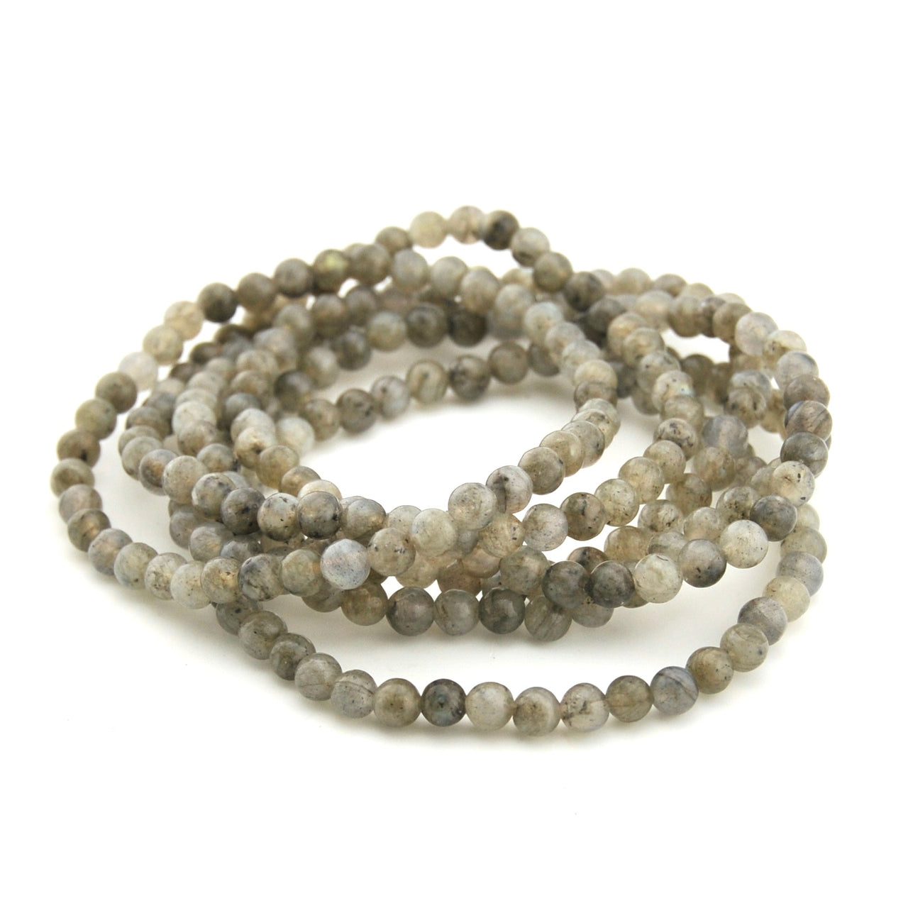 Beaded necklace with gray and white stones on a white background