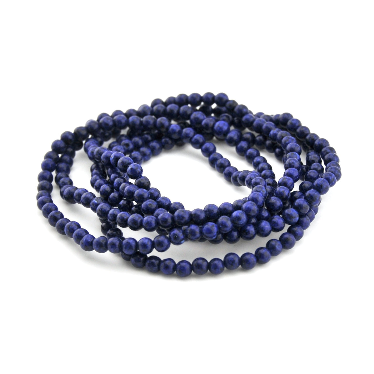 String of blue beads on a white background