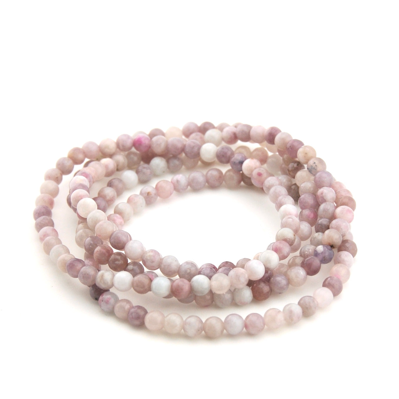 Set of three beaded bracelets on a white background