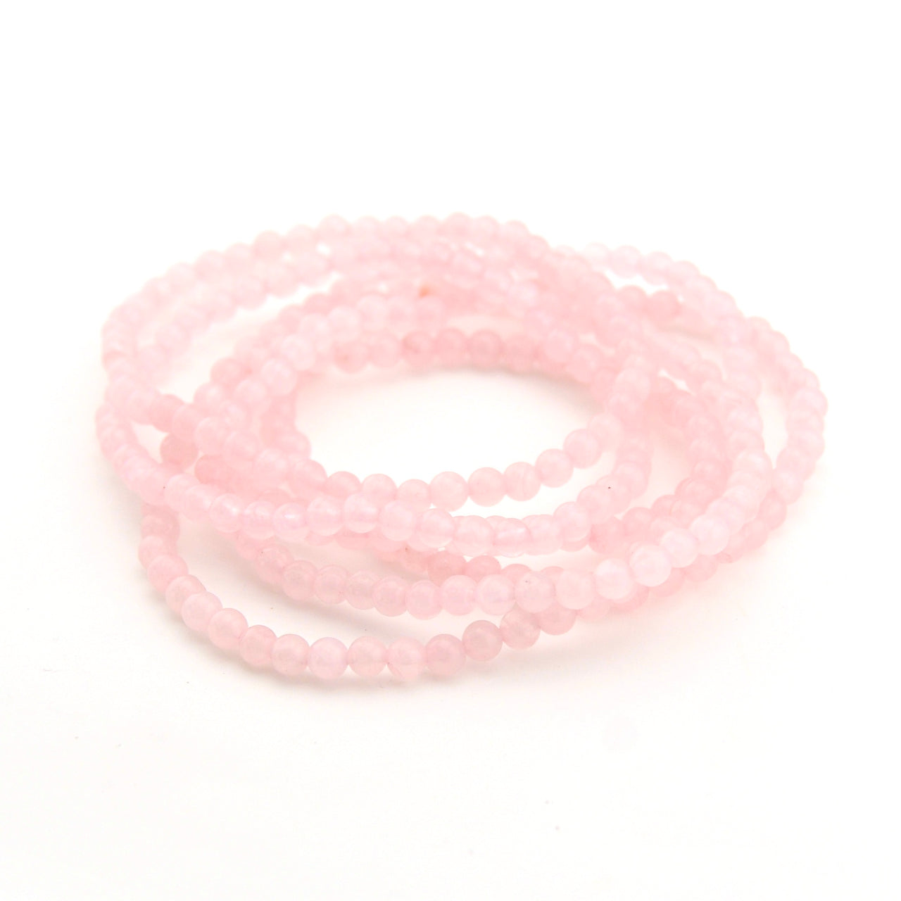 String of pink beads on a white background