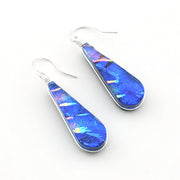 Dichroic Glass Rainbow Blue Tear Earrings on white background.