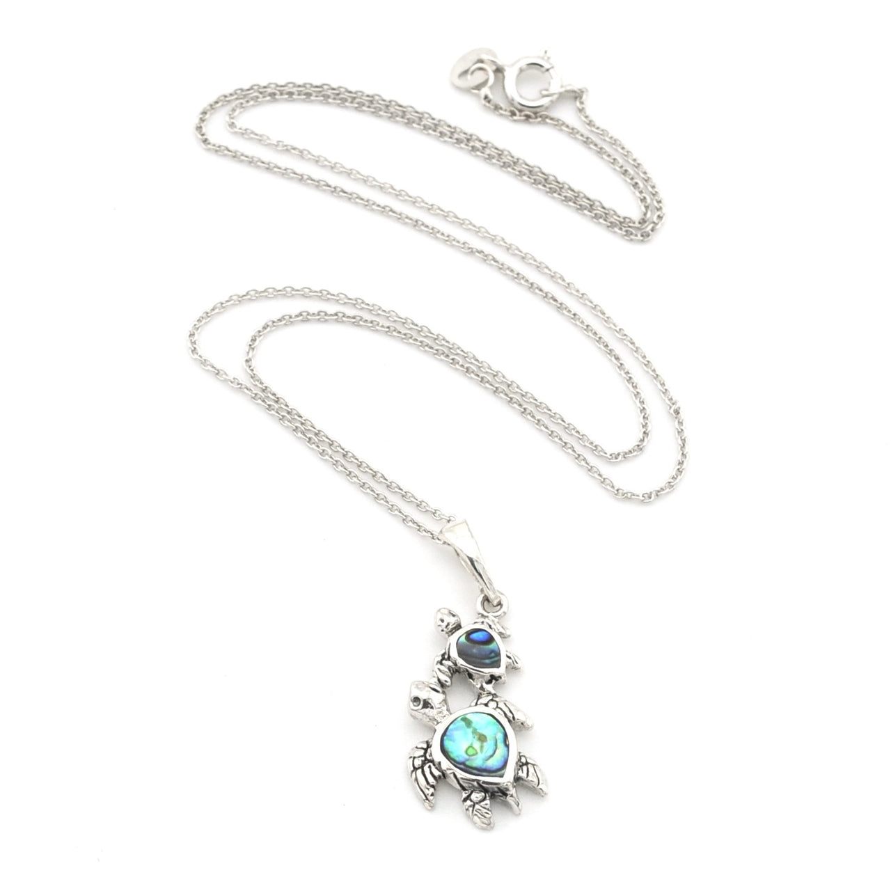 A silver-toned turtle pendant necklace featuring iridescent blue-green abalone shell inlays on the turtles' shells, displayed on a clean white background.