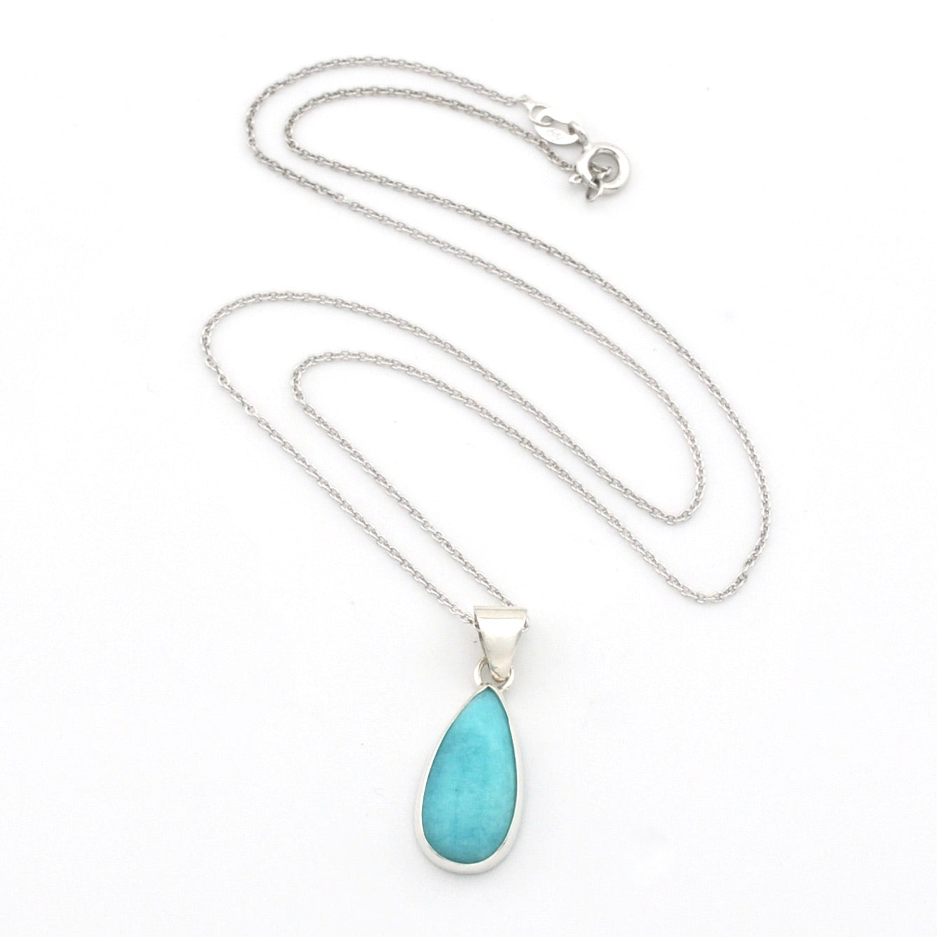 A silver teardrop pendant necklace featuring a light turquoise blue stone, displayed on a clean white background.