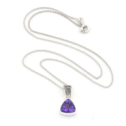 A silver chain necklace with a triangular bezel-set purple crystal pendant, displayed on a clean white background.