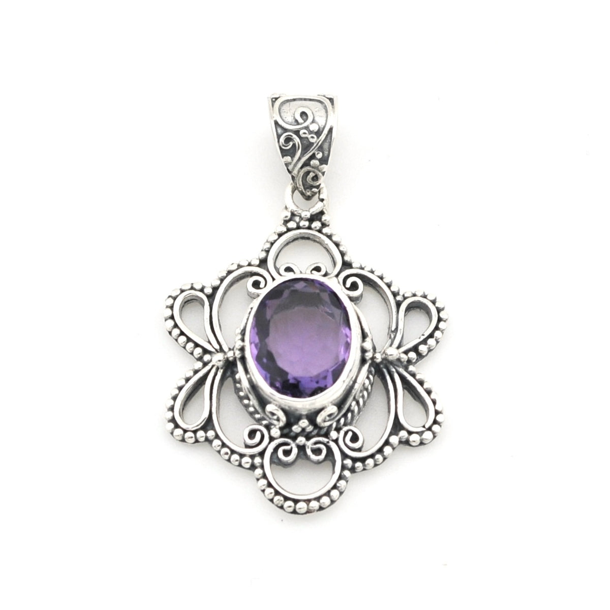 A silver filigree pendant featuring an oval purple amethyst gemstone in the center, set against a plain white background.