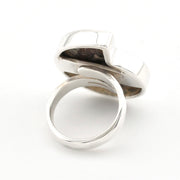 A polished silver ring displayed on a clean white background.