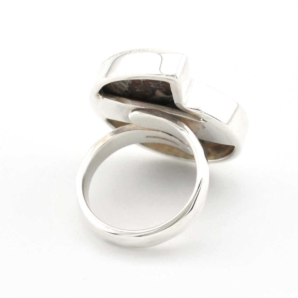 A polished silver ring displayed on a clean white background.