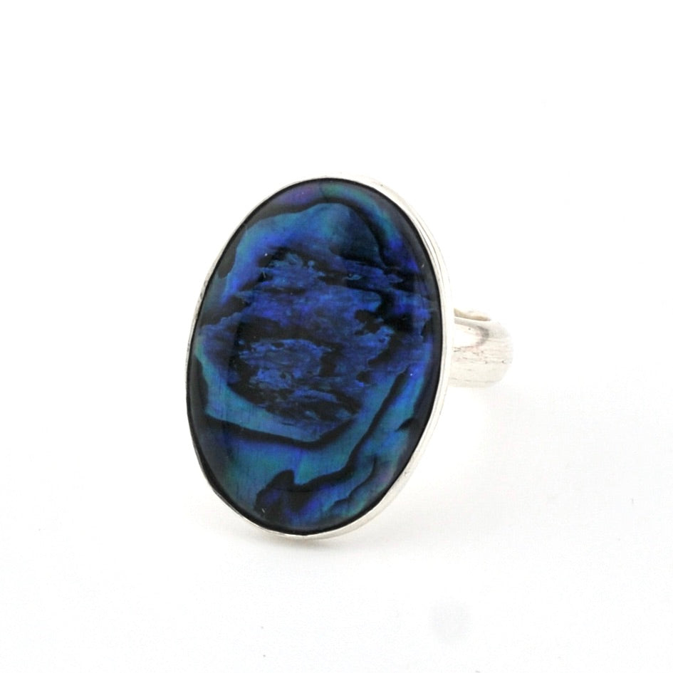 Blue oval stone ring on a white background