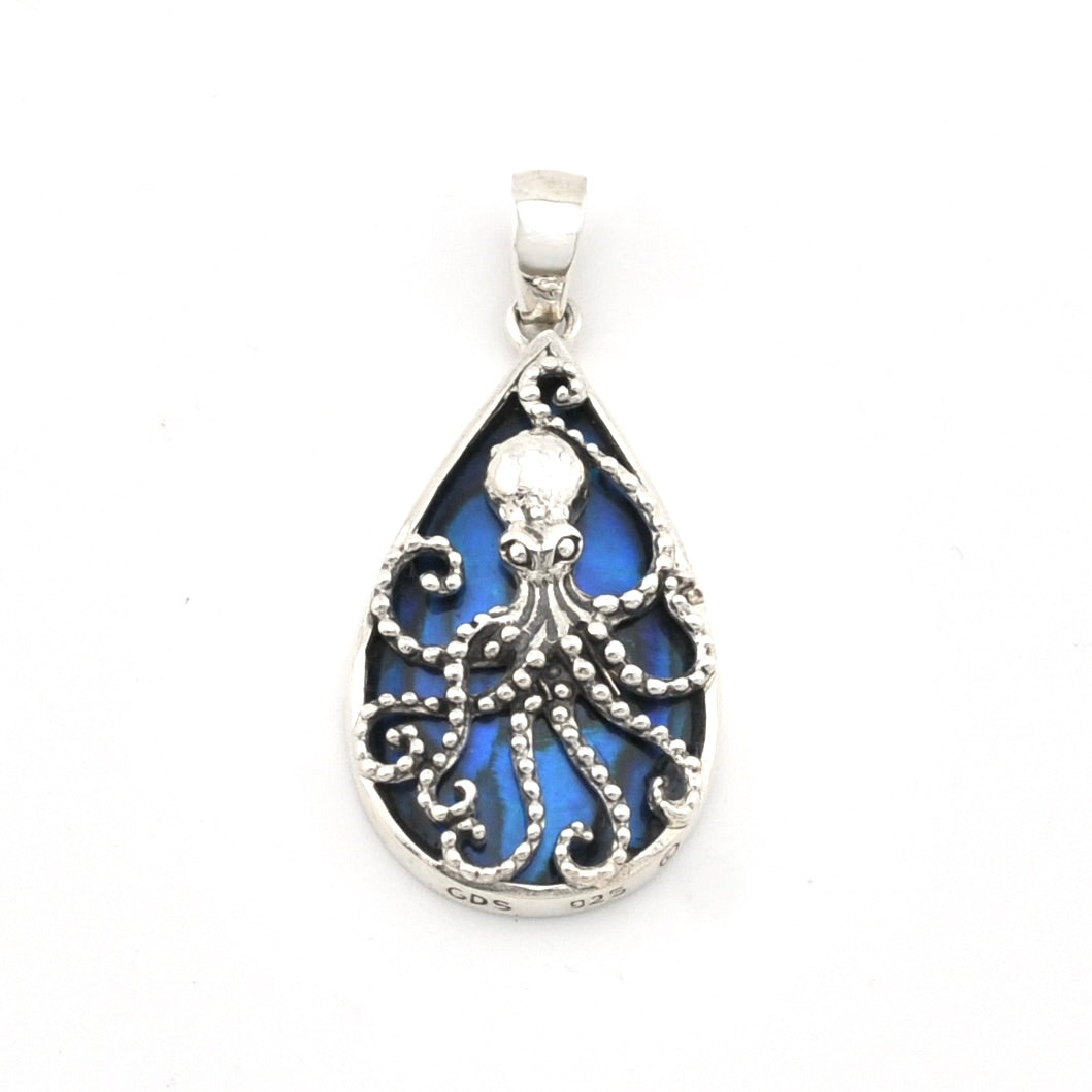 Tear shaped pendant with an octopus design and blue abalone.