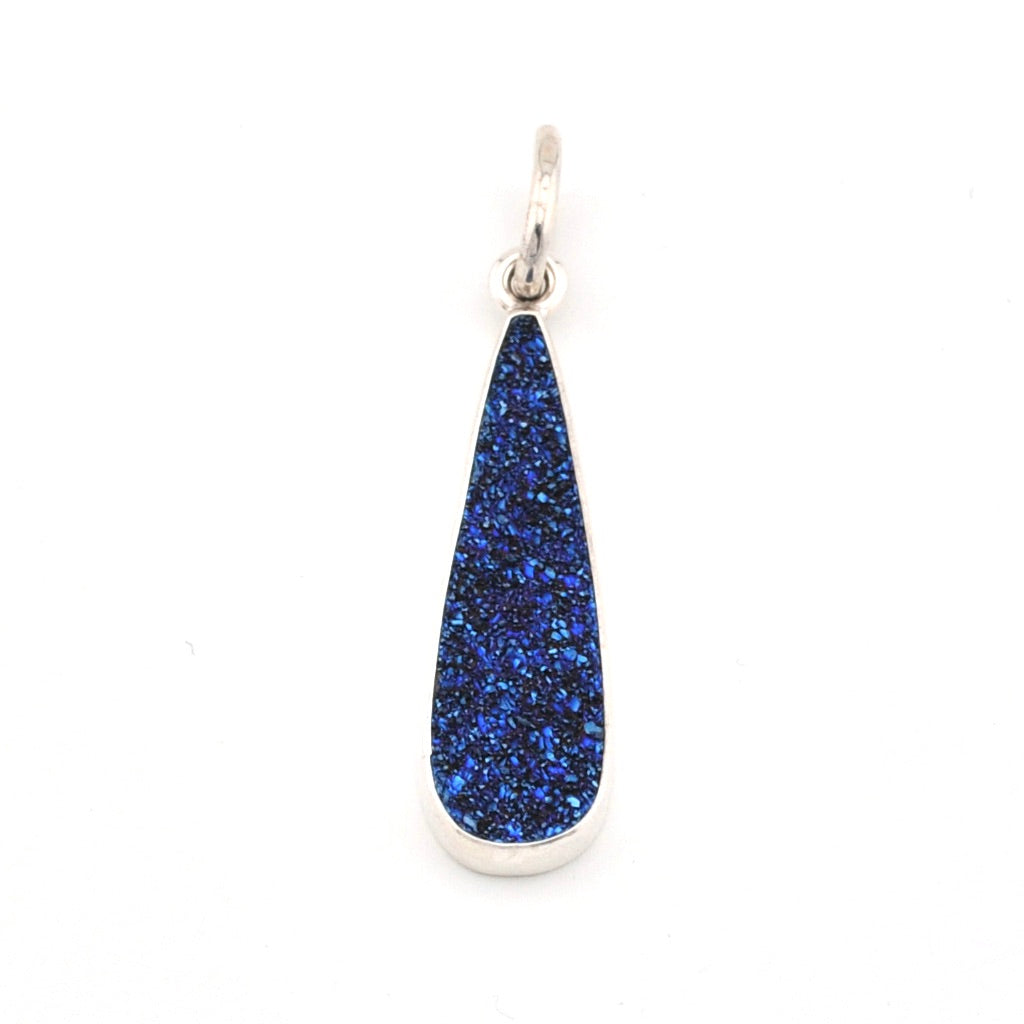 Teardrop-shaped blue pendant on a white background