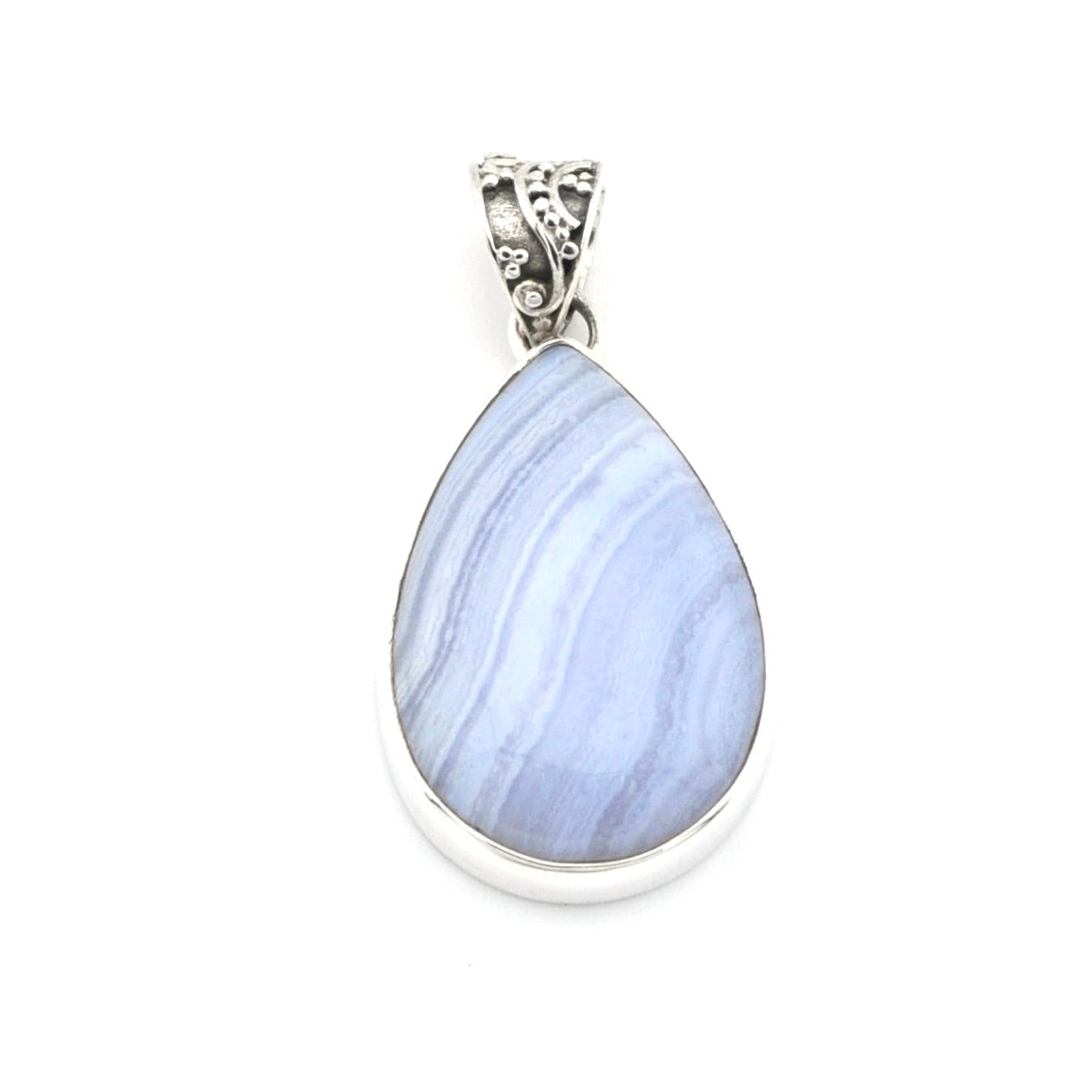 A silver teardrop pendant featuring a light blue and lavender marbled stone, set in a polished silver bezel with an ornate silver bail.