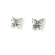 Silver butterfly earrings on a white background