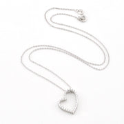 A silver heart-shaped pendant necklace with a delicate chain, displayed on a clean white background.