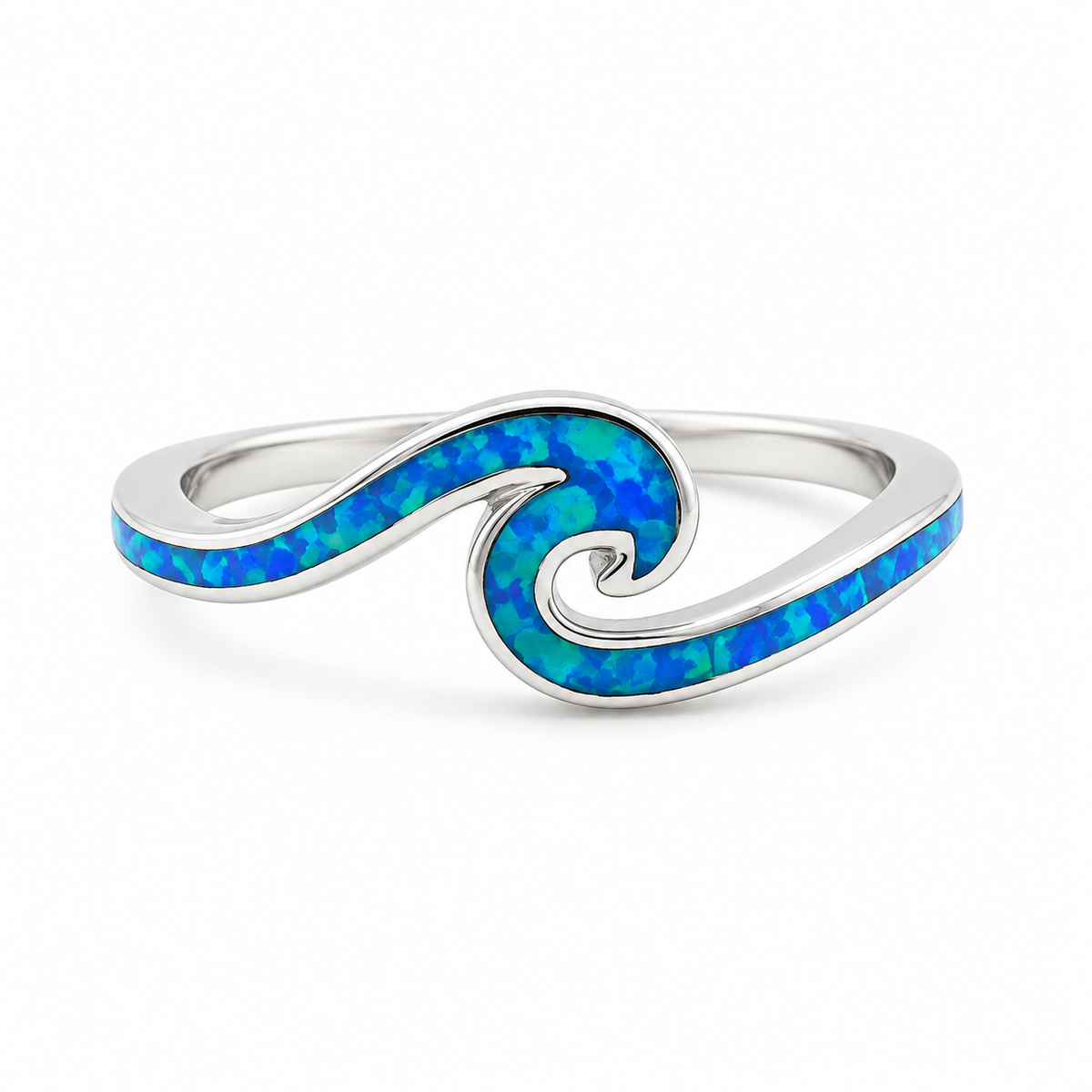 A silver wave-shaped ring featuring a vibrant blue opal inlay, set against a clean white background.