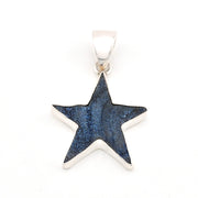 Star-shaped pendant with blue glittery center on a white background