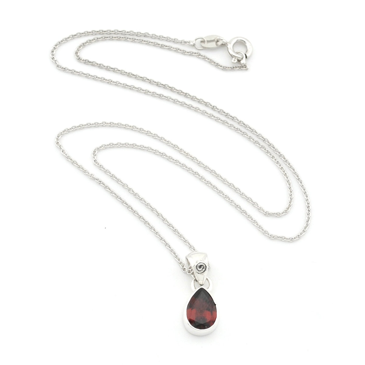 A silver chain necklace with a teardrop-shaped dark red gemstone pendant, displayed on a clean white background.