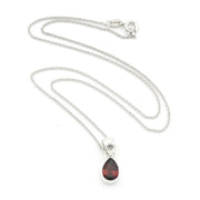A silver chain necklace with a teardrop-shaped dark red gemstone pendant, displayed on a clean white background.