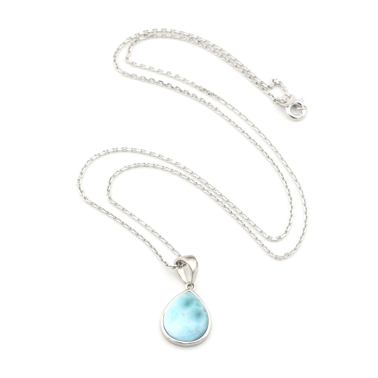 Necklace with a teardrop-shaped larimar pendant on a white background