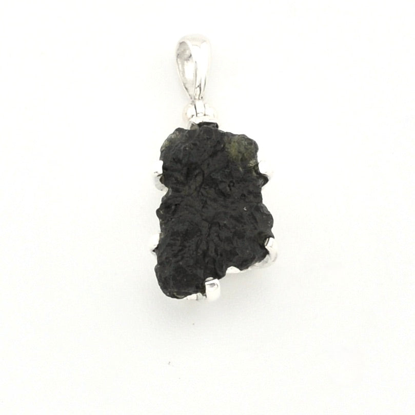 A raw moldavite pendant with a polished silver bail, shown on a plain white background.