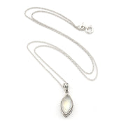 A silver chain necklace with a marquise-shaped moonstone pendant in a silver bezel setting, displayed on a clean white background.