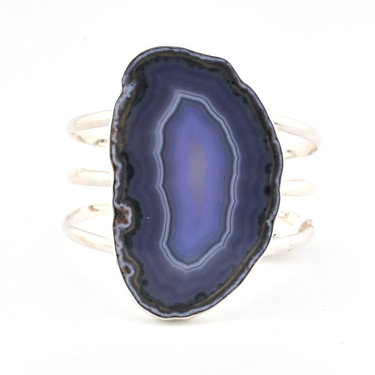 Purple agate slice bracelet on a white background