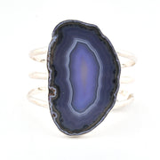 Purple agate slice bracelet on a white background