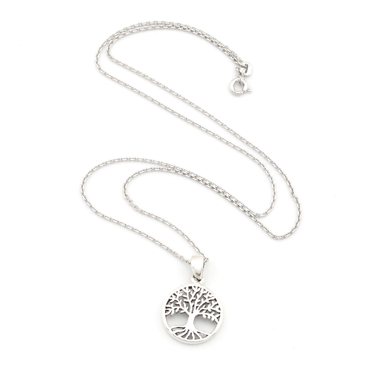 Silver tree of life necklace on a white background