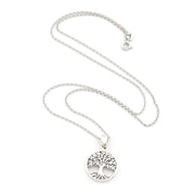 Silver tree of life necklace on a white background