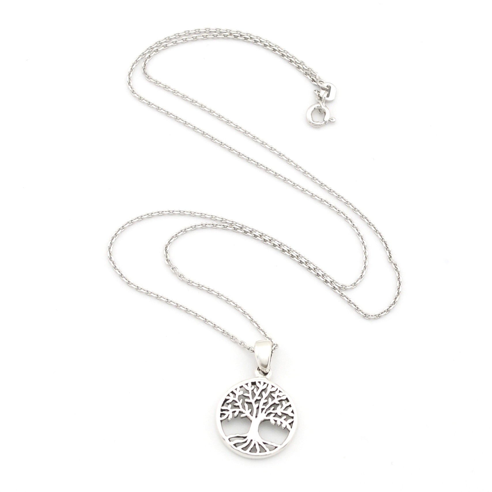 Silver tree of life necklace on a white background